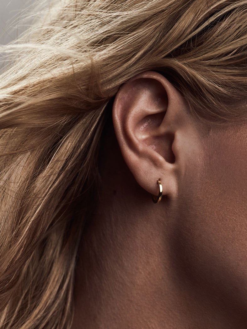 Gold Super Dainty Huggie Hoop earrrings by The Faint hearted Jewelry