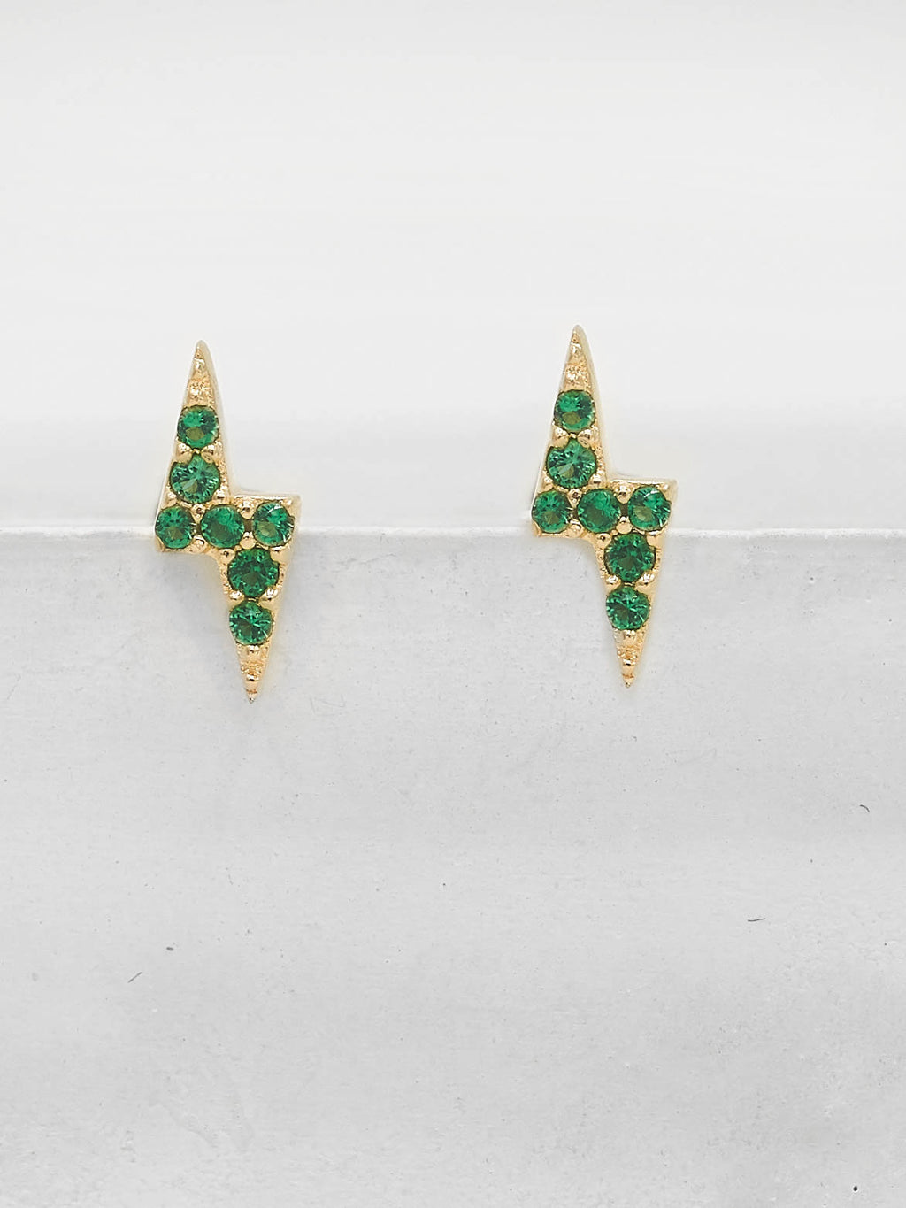 Tiny Lightning Bolt design with Green Emerald Round CZ Cubic Zirconia Stud Earrings by The Faint Hearted Jewelry